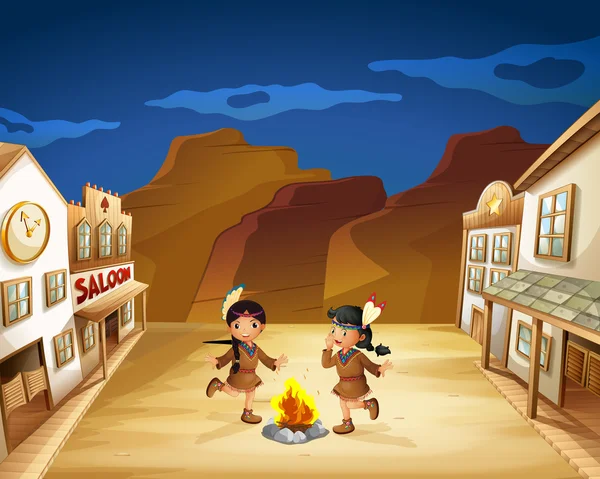 两个印第安女孩围着篝火跳舞 — 图库矢量图片