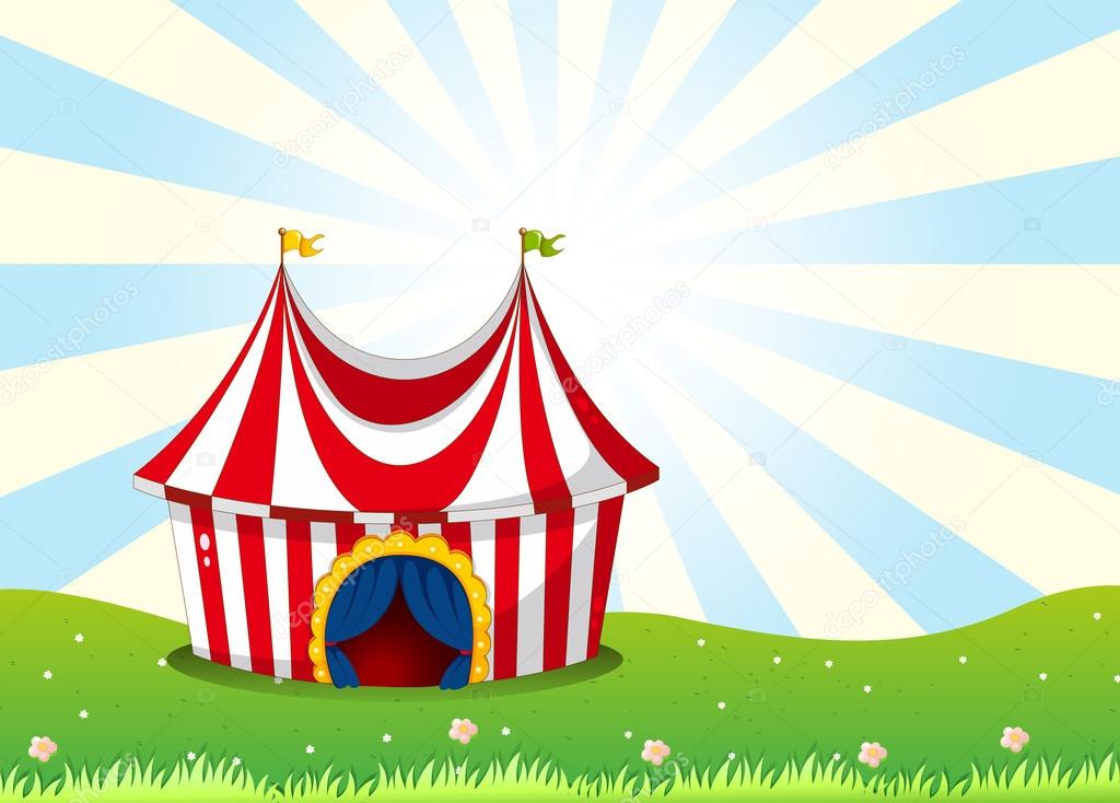 A circus tent at the top of the hill