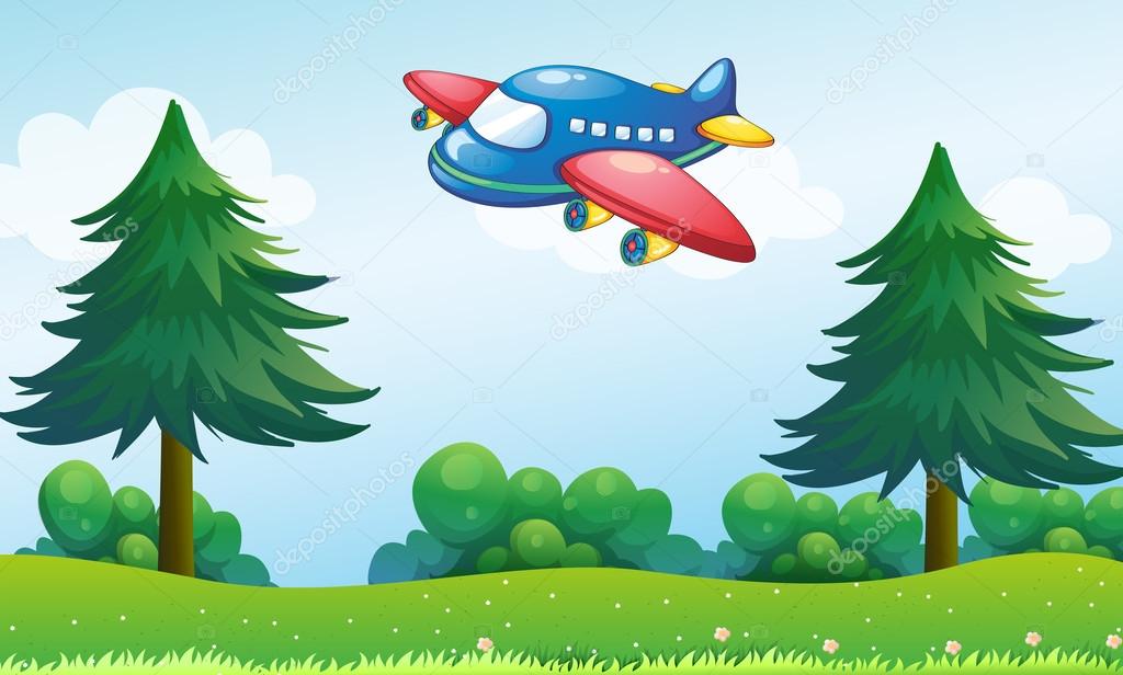 A toy plane flying above the hill