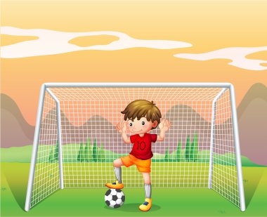 kırmızı gömlekli bir futbolcu