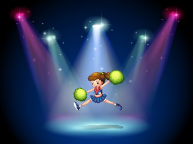sahne ışıkları ile sahnede atlama ponpon kız