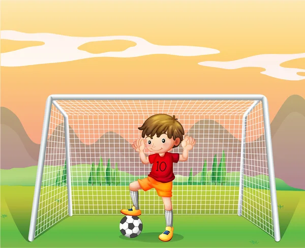 Un futbolista con camisa roja — Vector de stock