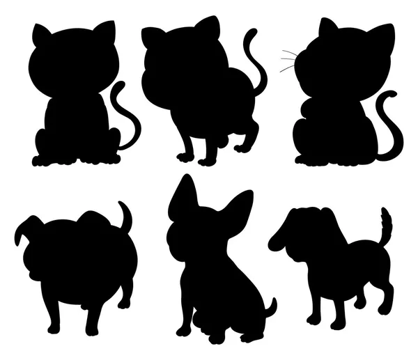 Silhouettes of cats and dogs — Stock Vector