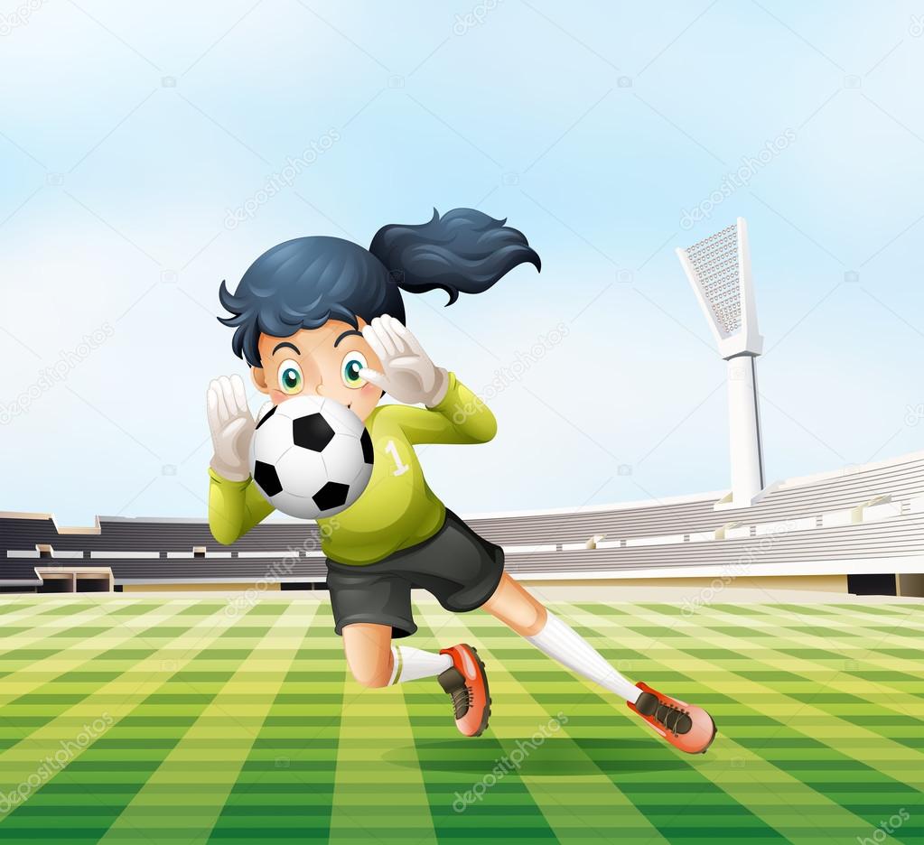 A female player catching the soccer ball