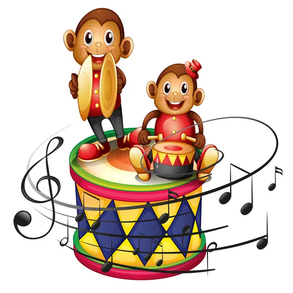 Two monkeys above a big drum — Stock Vector