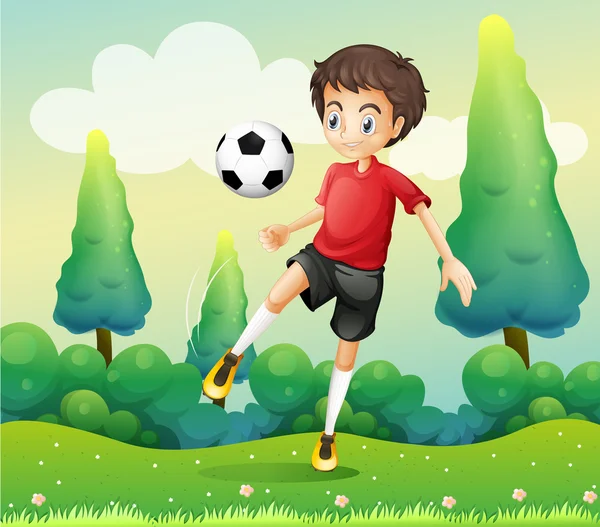 Un chico con una camisa roja pateando una pelota de fútbol — Vector de stock