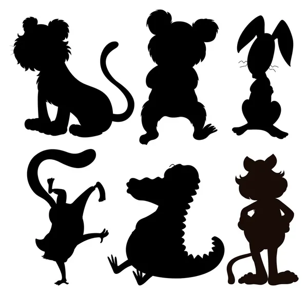 Six silhouettes of wild animals — Stock Vector
