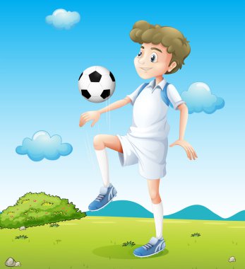 Gündüz futbol oynayan bir boy