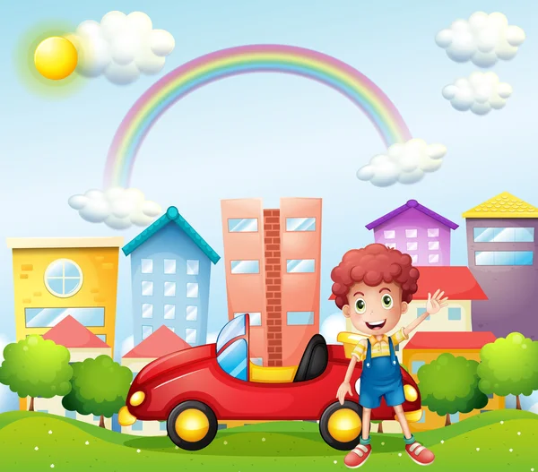A boy and his red car near the high buildings — Stock Vector