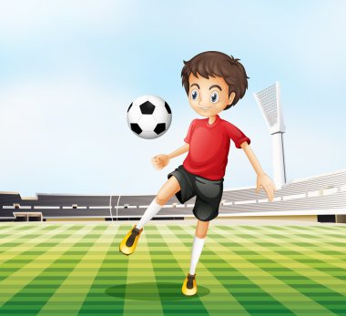 bir futbolcu onun kırmızı üniforma