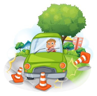 trafik konileri darbeleme yeşil bir araba