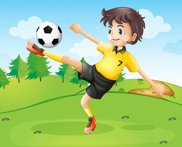 A female football player in her yellow uniform — Stock Vector