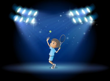 sahne ortasında Tenis oynayan bir boy