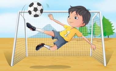 Futbol oyuncusu futbol topunu tekmeliyor.