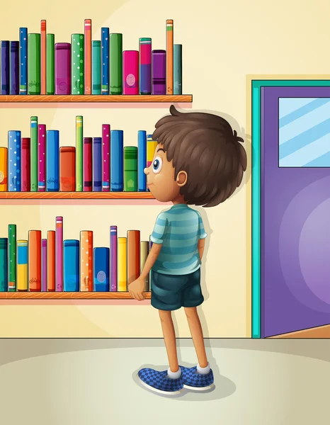 A boy inside the library — Stock Vector