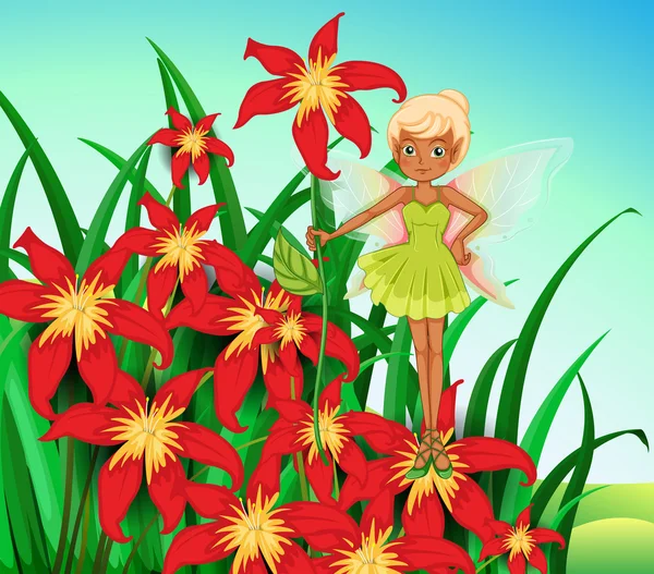 En fairy stående framför en röd blomma — Stock vektor