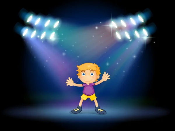 A cute little boy dancing in the middle of the stage — Stock Vector