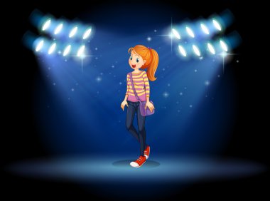 bir sapan sahne ortasında bir kızla