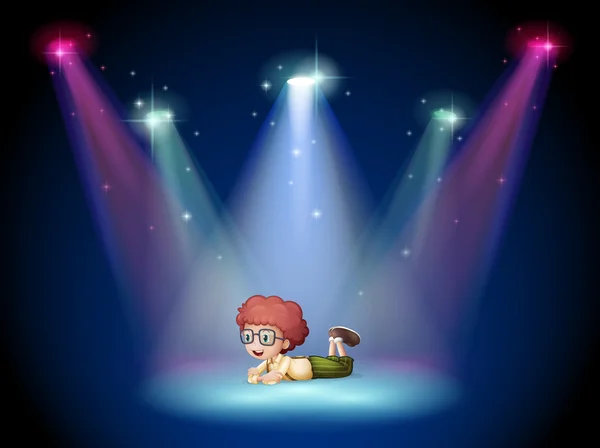 A boy lying in the middle of the stage with spotlights — Stock Vector