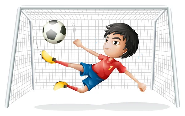 A boy playing soccer wearing a red uniform — Stock Vector