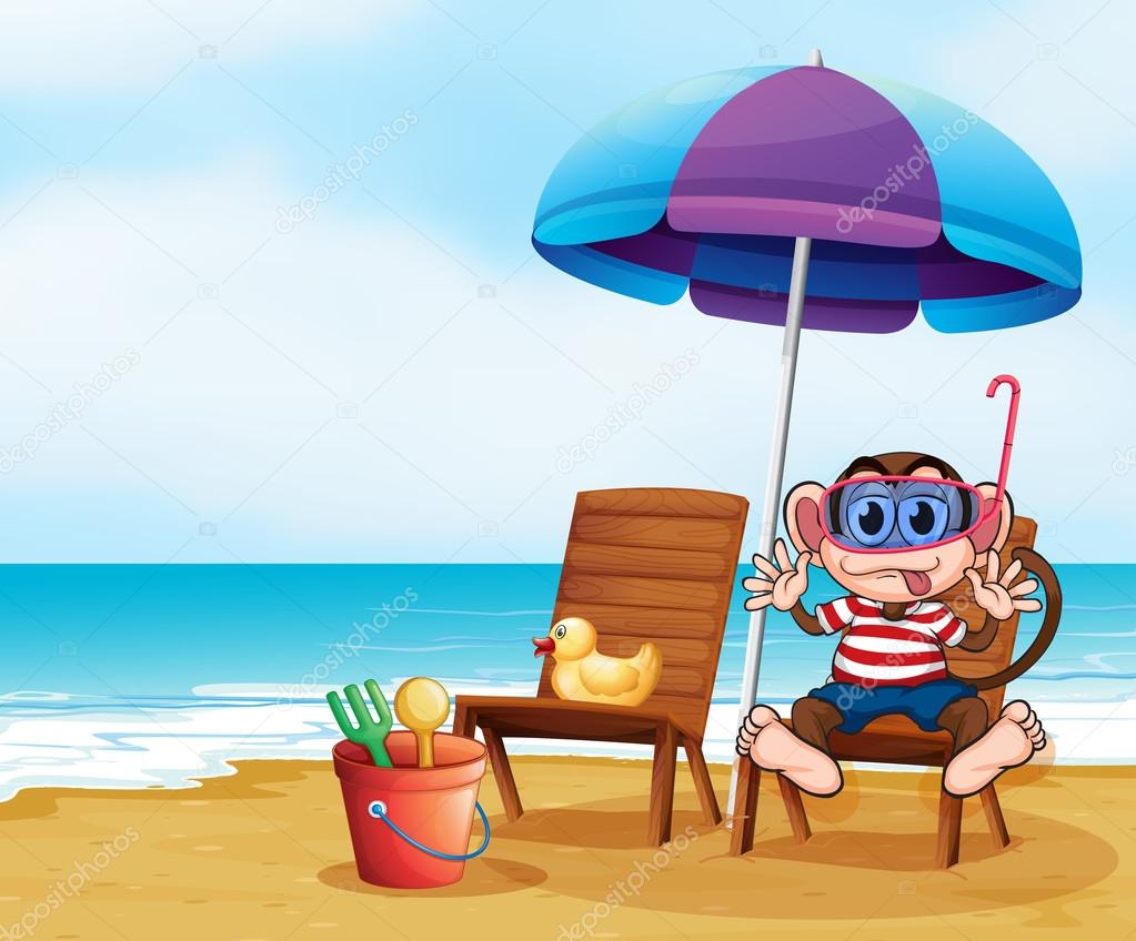 A monkey at the beach with toys
