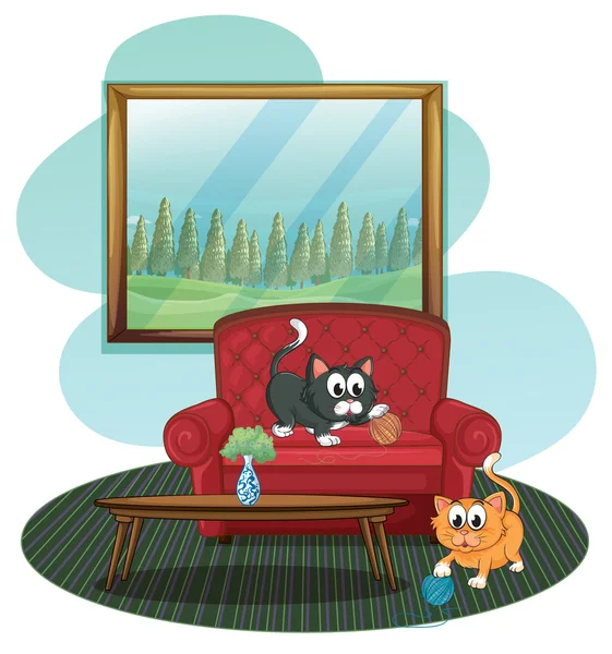 Two kittens playing at the sofa — Stock Vector