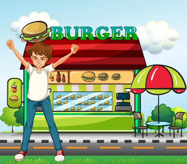 A man in front of the burger stand — Stock Vector