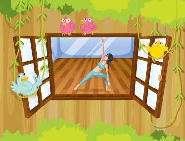 pencerenin yanında yoga yaparken bir kız