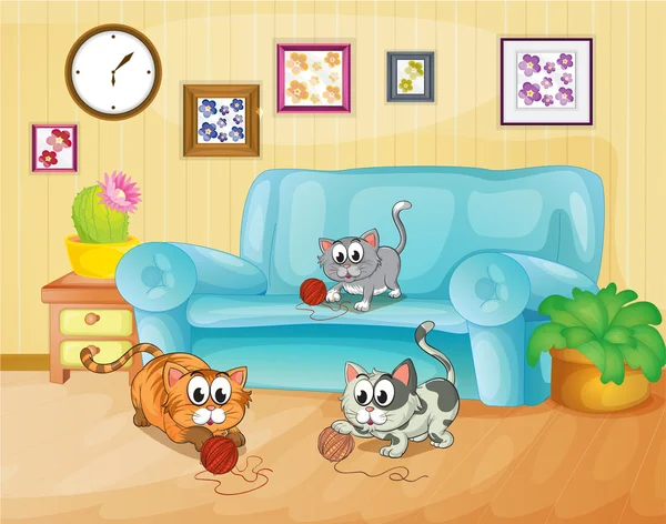 Tres gatos jugando dentro de la casa — Vector de stock