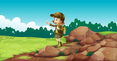 kayaların yanında bir kadın explorer