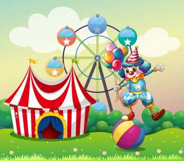 bir palyaço şişme bir karnaval baloda yukarıda Dengeleme