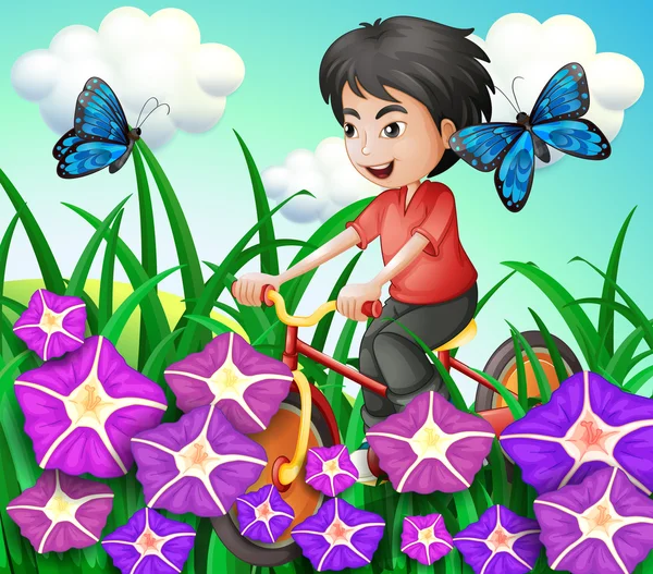 Мальчик катается на велосипеде в саду с цветами и бабочками — стоковый вектор