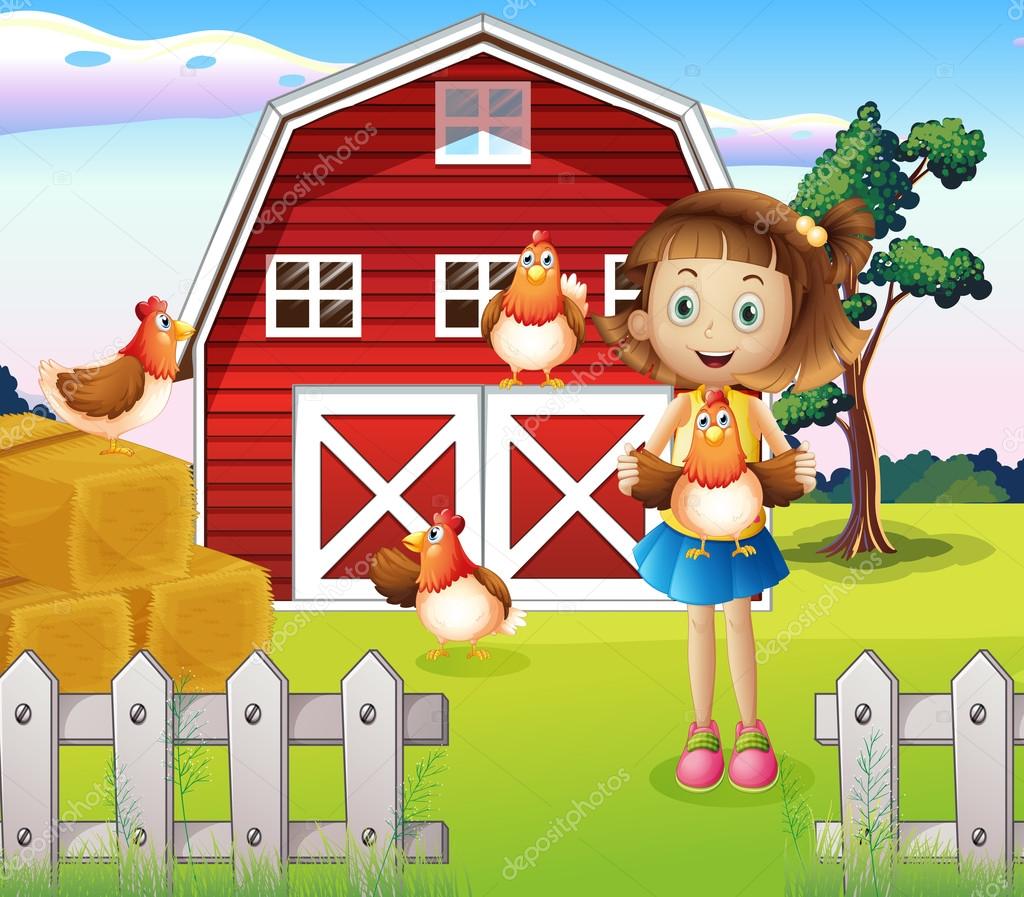A girl holding a chicken at the farm
