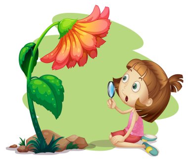 Büyüteç altında bir çiçek tutan bir kız