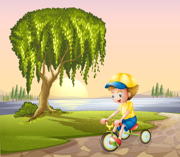 A little boy biking — Stock Vector