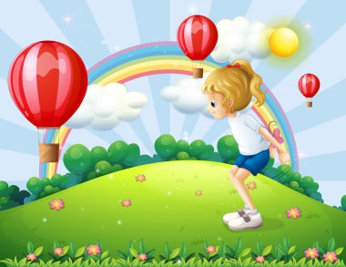 Balon yüzen ile Hill'de oynayan kız