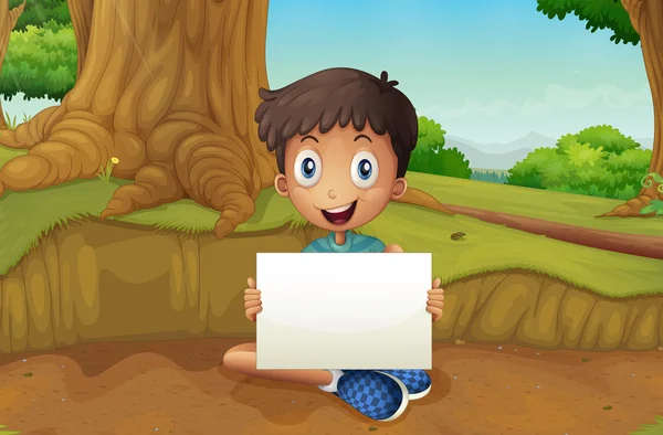 Um menino segurando uma tabuleta vazia perto da árvore gigante — Vetor de Stock