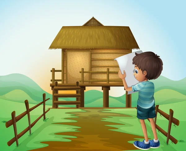 A boy with a paper in front of the nipa hut — Stock Vector