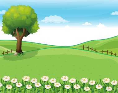 bir tepenin bir bahçeye ve dev bir ağaç