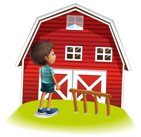 Un ragazzo in piedi di fronte alla fattoria rossa — Vettoriale Stock