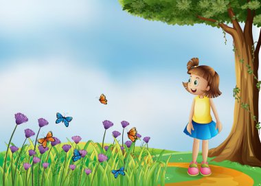 tepenin bir bahçe ile mutlu bir kız