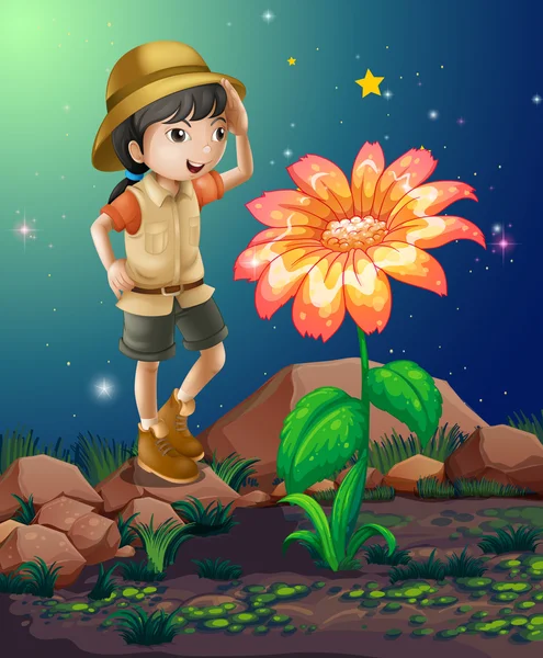 Una niña exploradora cerca de la flor gigante — Vector de stock