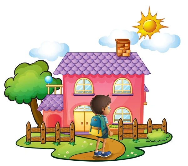 En pojke framför det stora rosa huset — Stock vektor