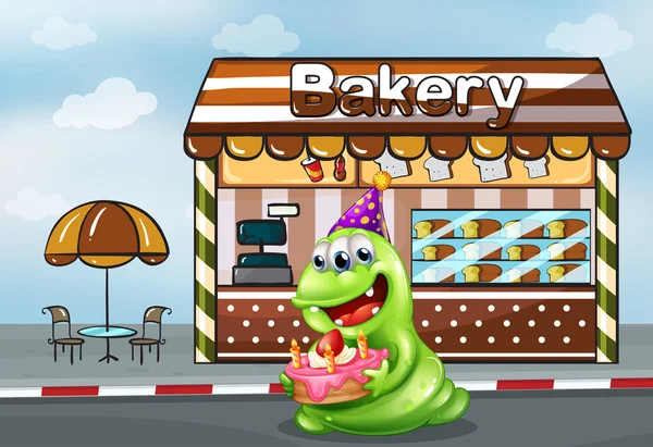 Un monstruo con un pastel cerca de la panadería — Vector de stock