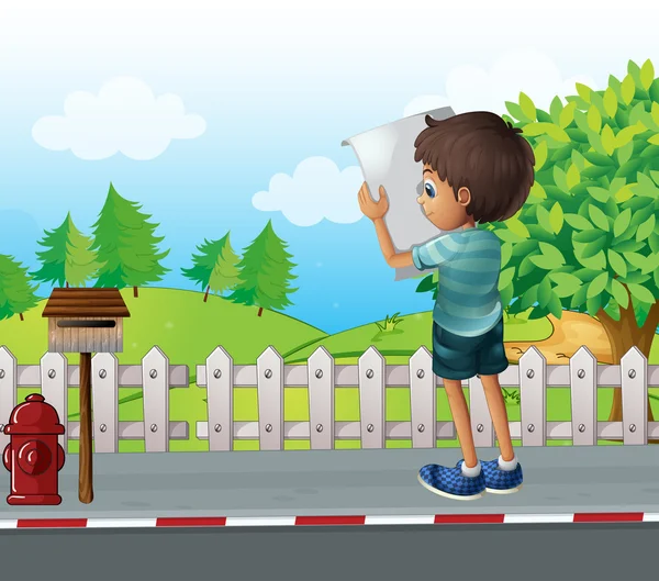 A boy with a paper standing near the fence at the street — Stock Vector