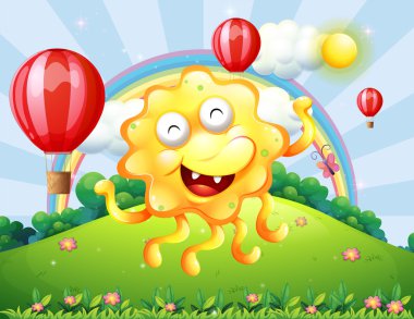 tepenin bir gökkuşağı ile mutlu bir sarı monster ve süzülen
