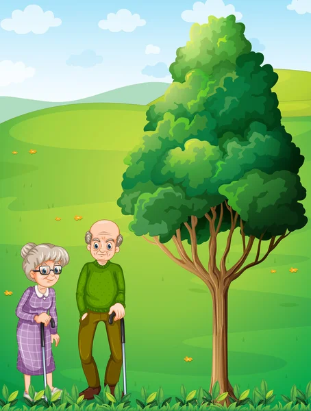 Two grandparents at the hill near the tree — Stock Vector