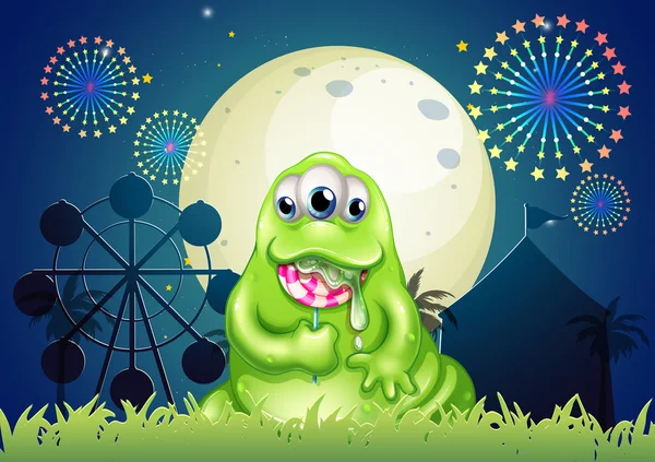 Een monster een lolly eten in het amusement park — Stockvector