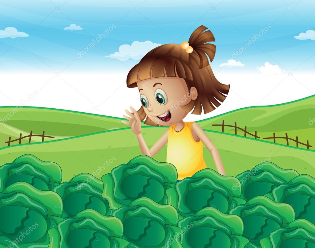 A young girl watching the growing vegetables at the farm