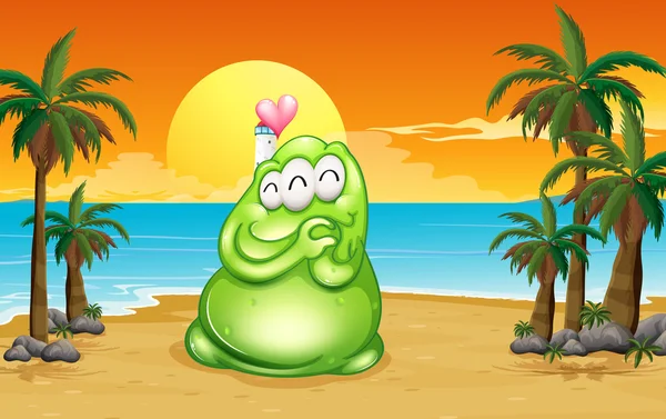 Een strand met een groene monster — Stockvector